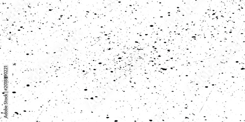 Valokuva Minimalist grunge background with black ink splatters, scattered specks, dots, grain and subtle scratch marks on a clean white surface, abstract edgy style