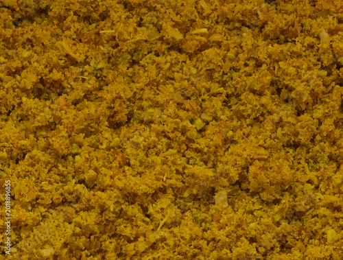 Konstfotografi Nahaufnahme von gelbem Currypulver als aromatische Textur