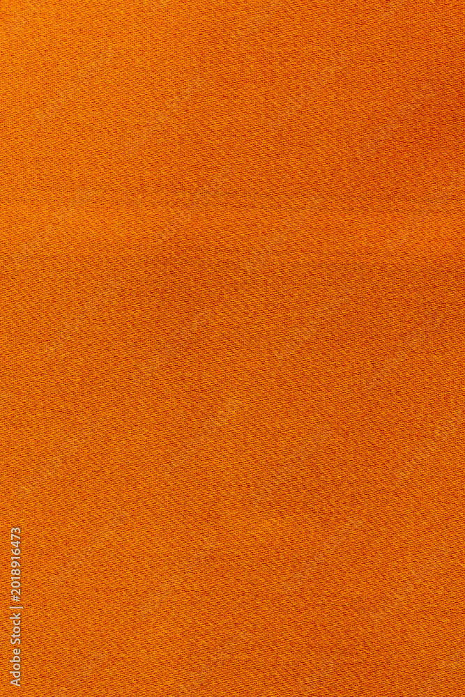 Fototapeta premium orange silk fabric for making clothes and other items, soft fine silk quality fabric for making clothes