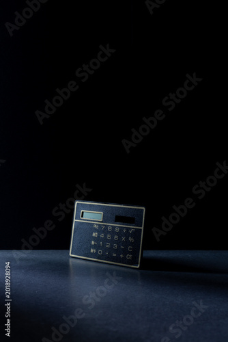 calculator finance accounting dark background