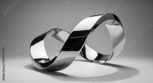 Abstract Infinity Symbol Sculptural Form Mobius Strip Art in Silver Tone Surface Loop Figure Eternal Conceptual Design Metallic Sculpture