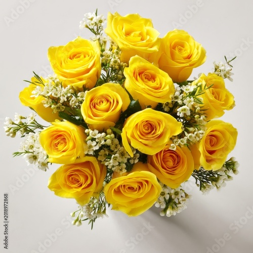 Bright Yellow Roses Arranged With White Flowers in a Circular Bouquet on a Li...