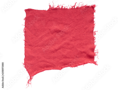 a piece of torn red rag on a white background