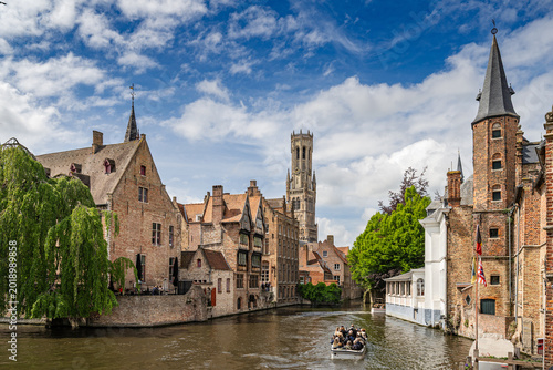 Bruges, Belgium. The Rozenhoedkaai canal in Bruges with the Belfry