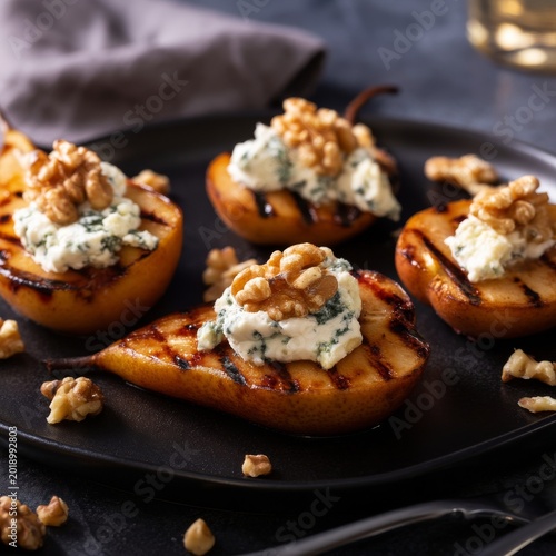 Grilled Pears Served With Cheese and Walnuts at a Dining Table During a Gathe...