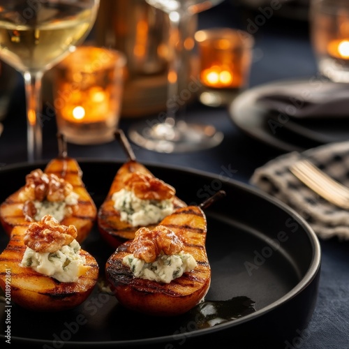 Grilled Pears Served With Cheese and Walnuts at a Dining Table During a Gathe...