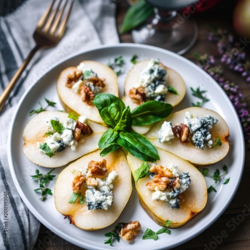 Sliced Pears With Cheese and Nuts Served on a White Plate at a Dining Table