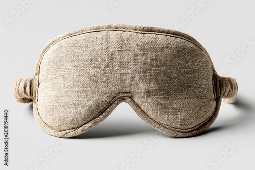 Soft beige sleep mask made of textured fabric