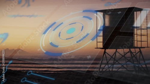 HUD appearing and rotating, framing drifting right, pulsing rings centering lifeguard tower sunset