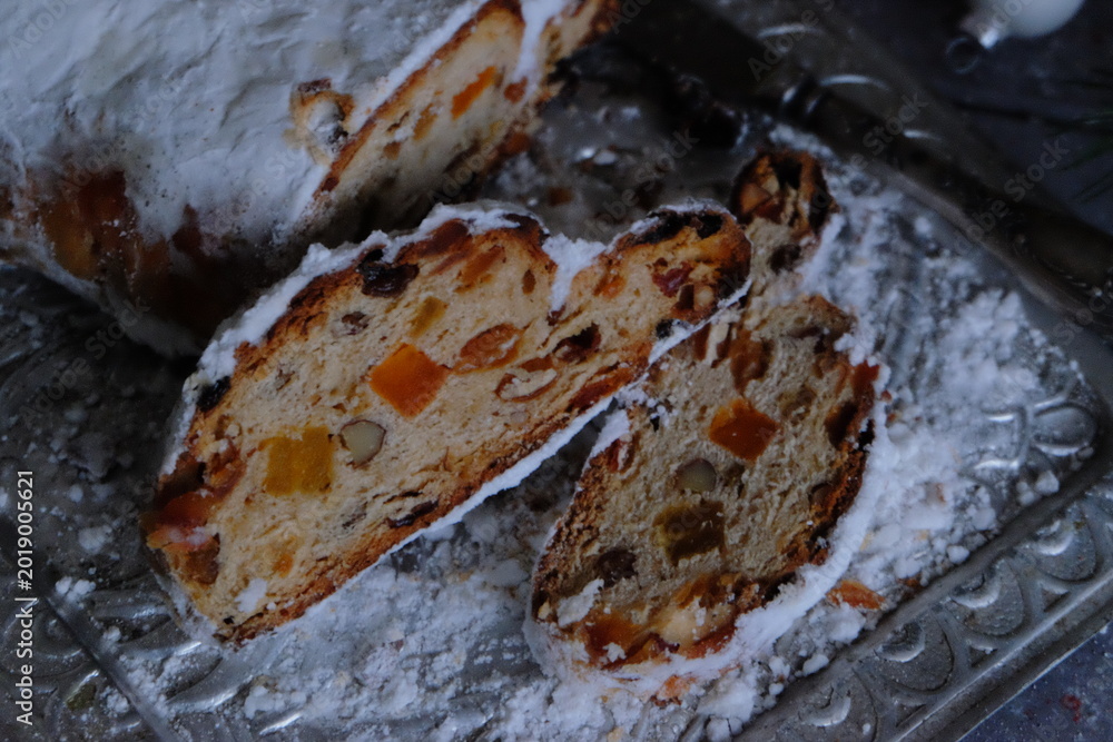 Fototapeta premium Traditional loaf with candied fruits and powdered sugar