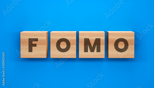 Schilderij op canvas FOMO Block Letter: Wooden blocks spell out FOMO against a vibrant blue backdrop