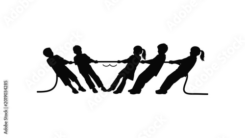 Photos Group of children playing tug of war game