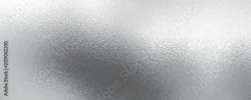 Cuadro en lienzo Shiny silver foil metallic texture - glossy gray steel gleaming surface, frosted glass effect with blur glare reflection, bright polished metal material