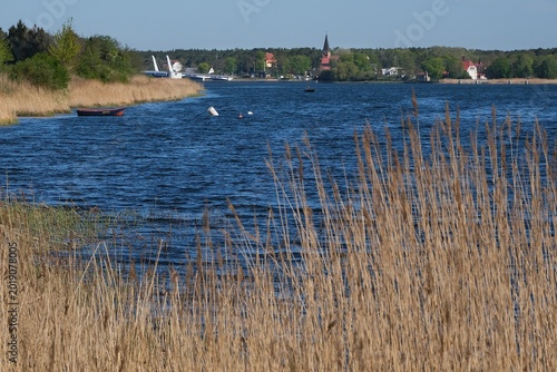 Bild auf Leinwand Scenery of mouth of Vistula river and buildings of Mikoszewo villge, by Baltic Sea