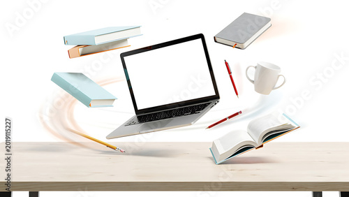 Laptop surrounded by notebooks and office supplies on light wooden desk