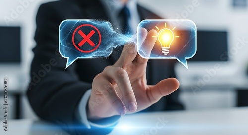 Constructive feedback concept. A manager's hand transforms a holographic 'speech bubble' with an X inside into one with a lightbulb, symbolizing constructive feedback.