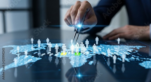 Niche market targeting. A strategist's hand uses holographic 'tweezers' to select a small group of person icons from a larger crowd.