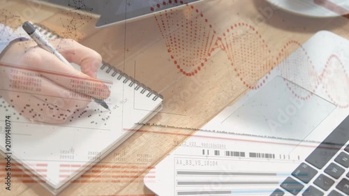Poised right hand touching notebook and writing dotted marks while shifting spiral visualizing data