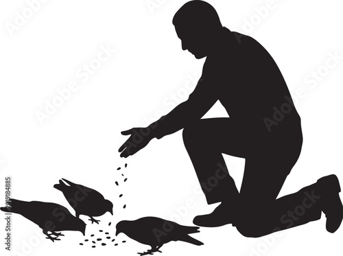 Schilderij op canvas Silhouette of a Man Kneeling Down and Feeding Pigeons Grain