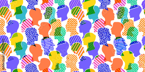 Colorful human head silhouettes in a dense overlapping pattern on a white background high quality