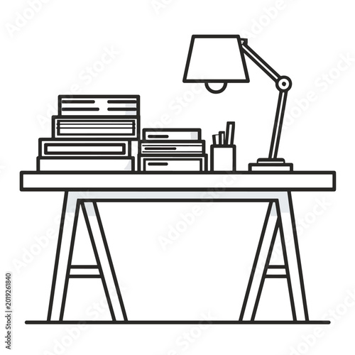 Desk with books and office lamp.