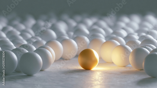 Golden sphere glows softly among white spheres
