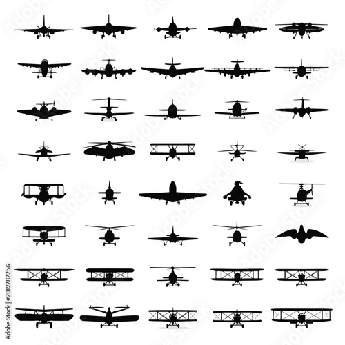 Collection of airplane silhouettes flying.