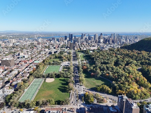 Tablou pe pânză Aerial view of Montreal skyline and Mount Royal Park on a sunny autumn day in Quebec, Canada