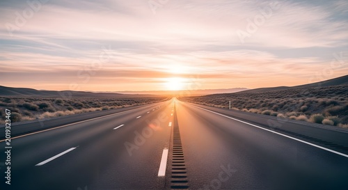 Vast open highway stretching towards a radiant sunset, painted with vibrant colors and dramatic shadows under a clear sky