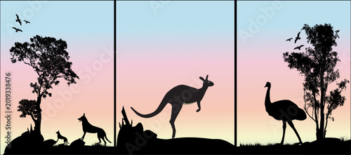 Schilderij op canvas Australian Outback Silhouettes at Sunset With Kangaroo, Dingo and Emu in Pastel