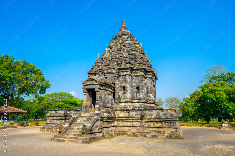 Naklejka premium Prambanan Temple, a magnificent 9th-century Hindu temple complex in Yogyakarta, Indonesia. This UNESCO World Heritage Site is the largest Hindu temple compound in Indonesia, dedicated to the Trimurti.