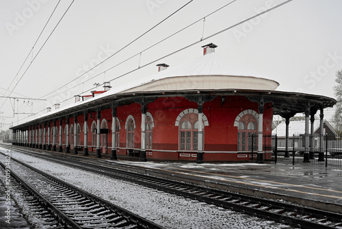 Historic building of the Malaya Vishera railway station on a winter day, Novgorod region of Russia