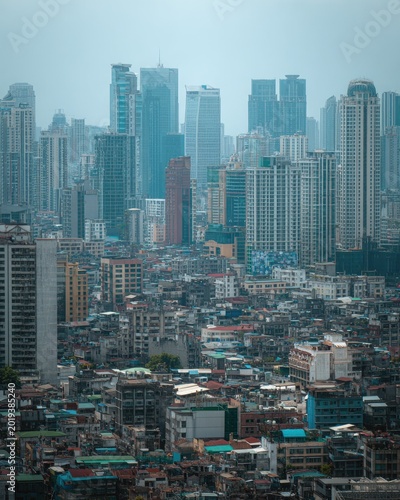 Dense Urban Landscape with Modern Skyscrapers and Older Buildings