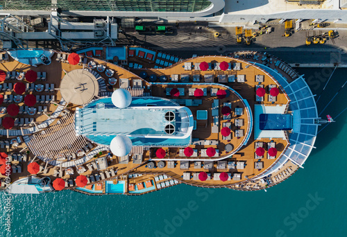 Luxury liner resort. Cruise ship voyage. Traveling by sea. Aerial top view of cruise in summer vacation. Cruise ship tour and travel at sea. Aerial view of luxury liner voyage. Ship top view