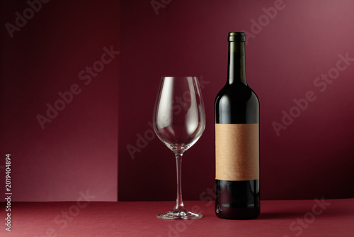 Фотография Red wine on a dark red background.