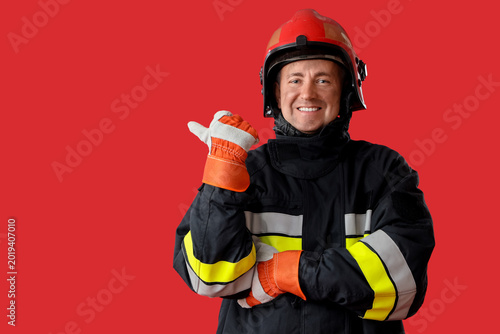 Happy mature male firefight...