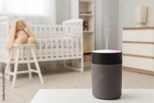 Glowing air humidifier on t...