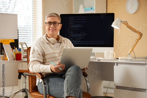 Female programmer working w...