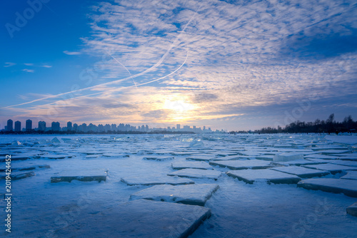 Wall Mural Ice cutted blocks field on the frozen surface of the Songhua river in Harbin, He