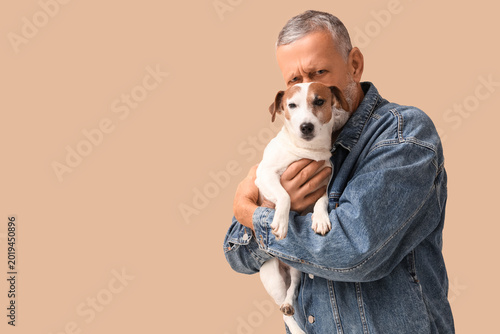 Middle-aged man and cute do...