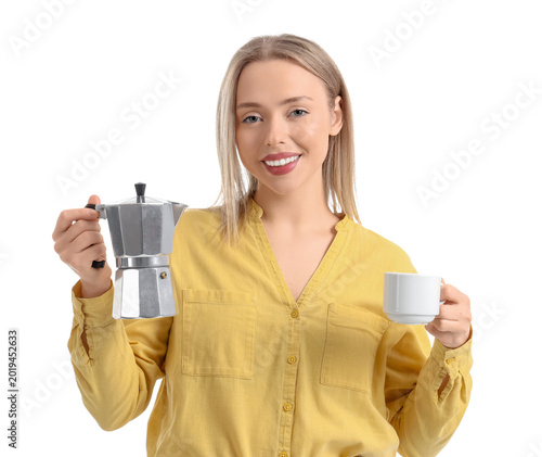 Smiling young woman holding...