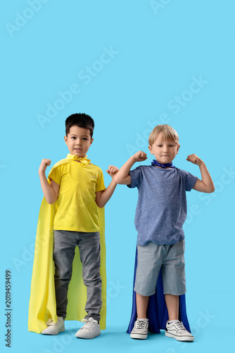 Cute little boys with super...