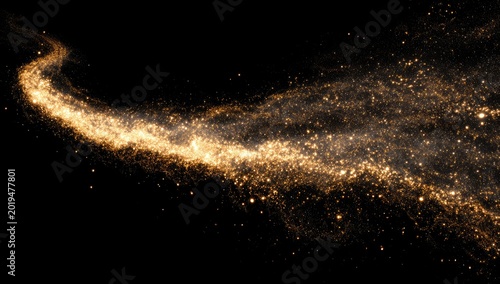 Glowing golden dust particles swirl in a luminous trail against black