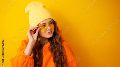 Brightly colored portrait of a stylish young woman