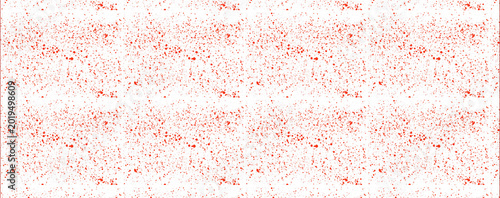 Red splatter pattern on white background