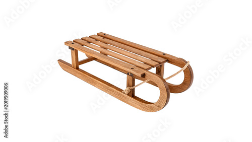 Fotografie Old vintage wooden sled or sleigh with a classic design for winter holiday fun a