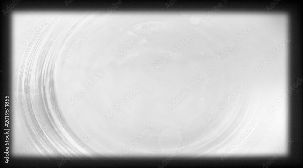 Fototapeta premium Black grunge frame with transparent film texture overlay isolated on PNG background.