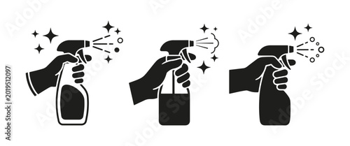 Slika na platnu Hands holding a spray bottle performing cleaning tasks symbolizing hygiene and s