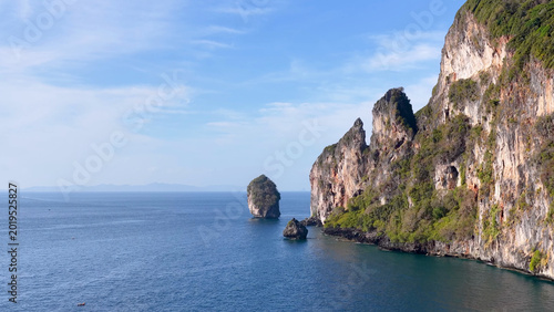 Aerial View of Towering Limestone Karst Cliffs and Turquoise Andaman Sea