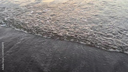 4K Waves Washing Over Black Sand Beach in Tamsui Taiwan